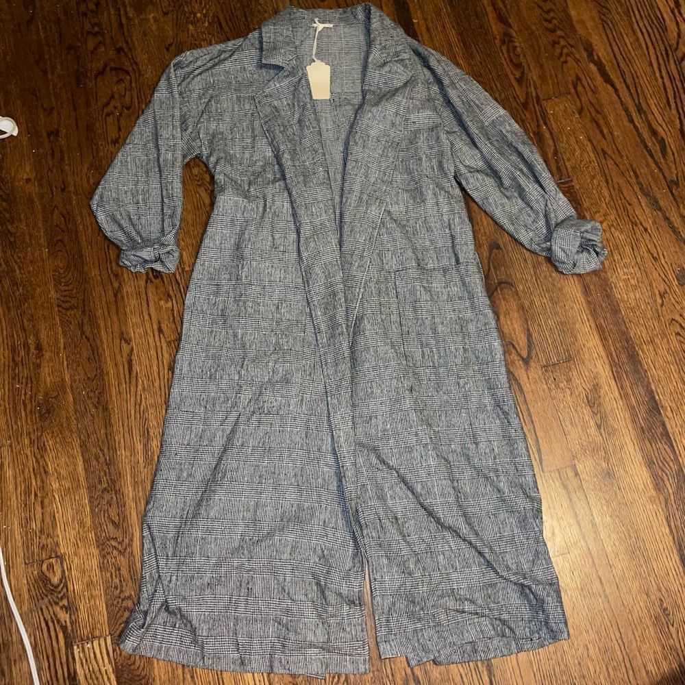 New hem and thread coat